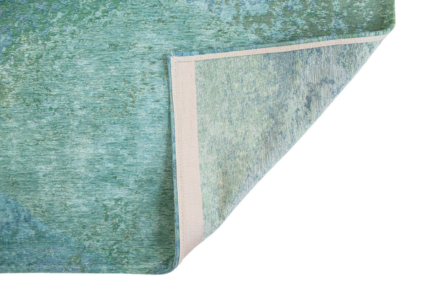 turkusowy dywan geometryczny Lisboa Jade Green 9053 zawinięty róg