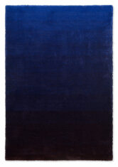 Niebiesko brązowy dywan firmy Brink and Campman, wełniany i miękki dywan do salonu.